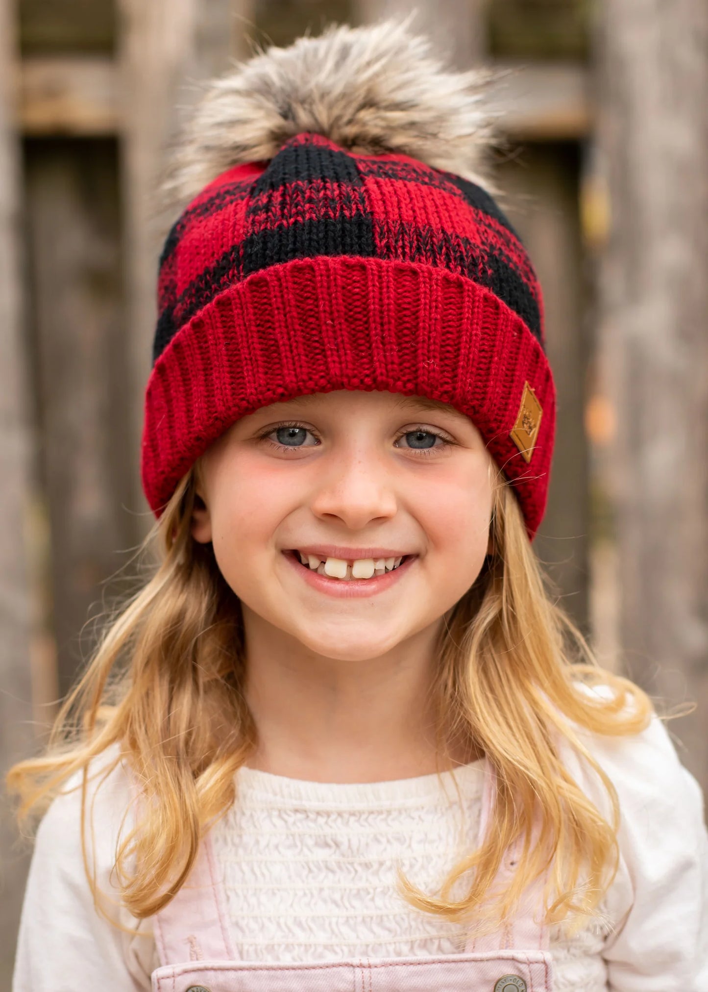Kids red and black buffalo plaid beanie with Pom