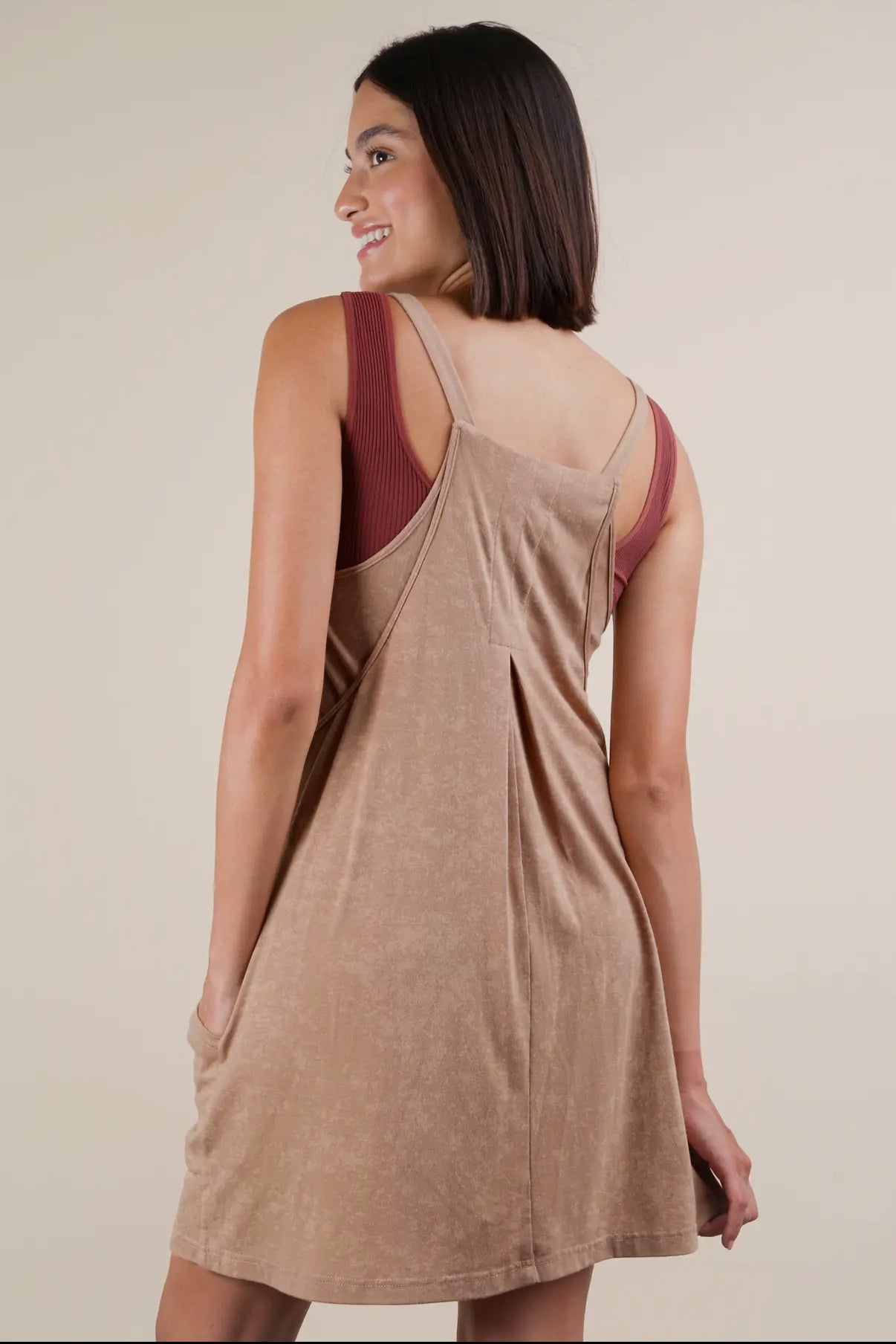 Taupe mineral washed knit mini dress with built in shorts and tank.