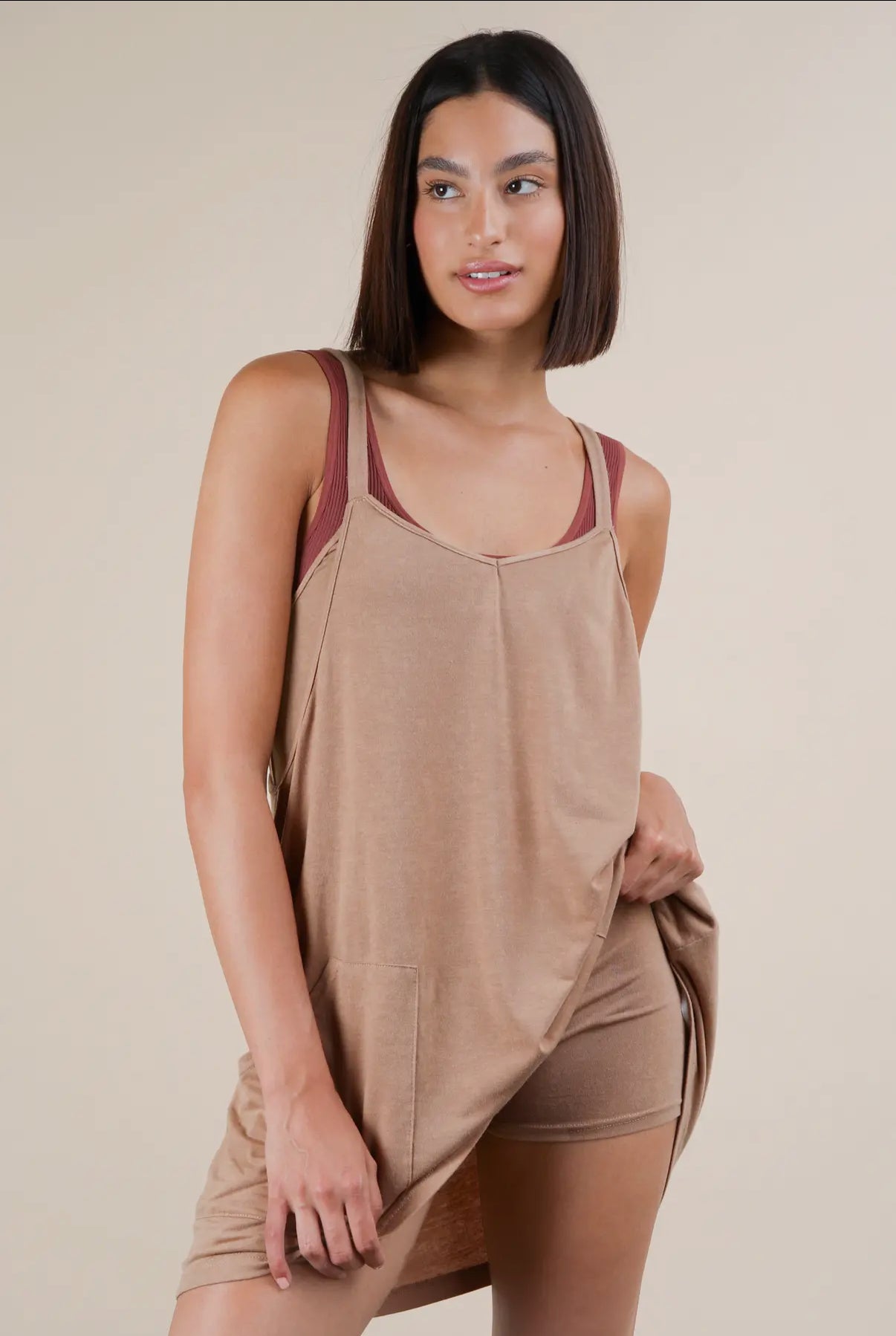 Taupe mineral washed knit mini dress with built in shorts and tank.